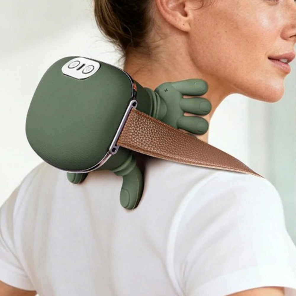 The Duskwell massager resting on a woman's neck and shoulders